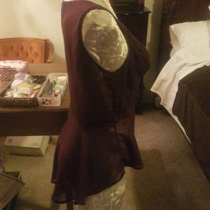 Lovely sleeveless top, sheer back, with long back